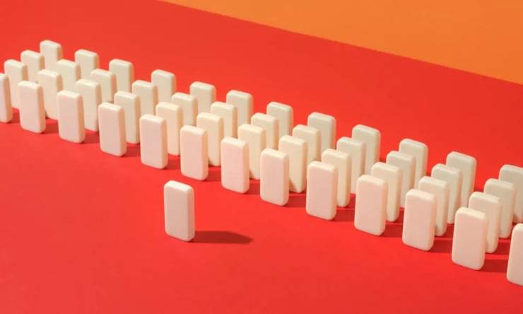 white rectangles lined up in formation on bright orange background