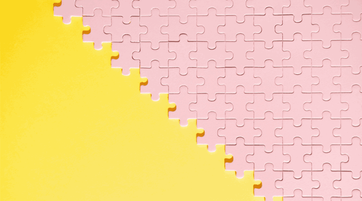 An image of a pink puzzle on a yellow background illustrates how planograms are an essential piece of your business strategy. 